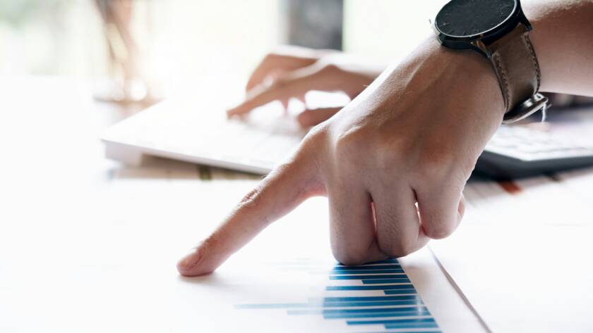 Businessman working with financial report. Concept for business, finance, market research, analytics