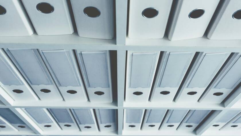 Corporate document archive files in ring binders