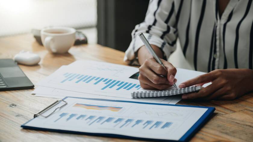 Female accounting or bookkeeper providing accounting service for small businesses, holding pen