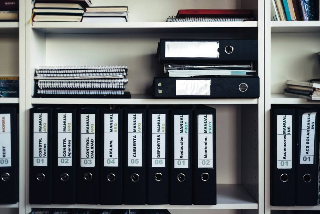 Shelf with documents in architectural firm in Madrid.