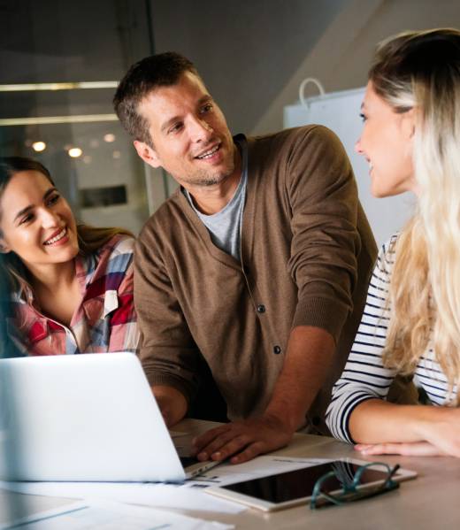 Successful multiethnic group of designers, architects, business people at work in office. Business startup concept.